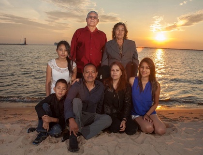 Photo Shoot of Family Group Picture On The Beach